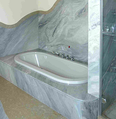 Pavimento e rivestimento in Marmo Iside Pearl e Palisandro nuvolato Blun